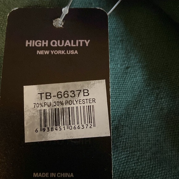 Tony and Tina crossbody pocketbook ,new w/ tag, white background w/ city scene - Picture 7 of 7